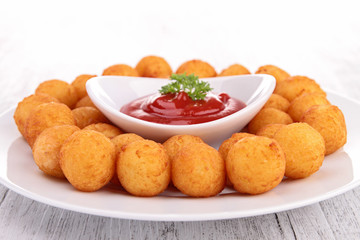 potato ball and ketchup