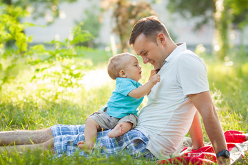 Father and san in park