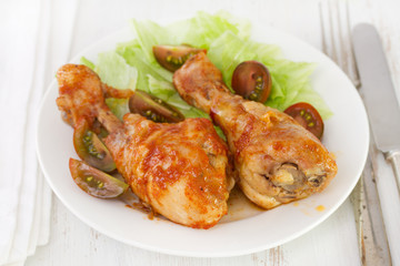 fried chicken with salad on white plate