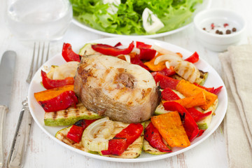 fish with vegetables and salad