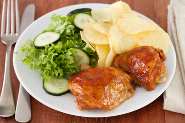 fried chicken with chips and salad
