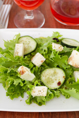salad with mozzarella on white plate