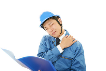 肩痛を訴える作業員