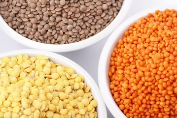 Three kinds of lentil in bowls
