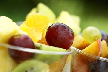 Detail of cups with fruit salads.