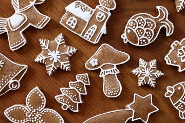 Gingerbread cookies on wooden background.