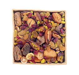 dry fruit and nuts in ceramic tray isolated on white background