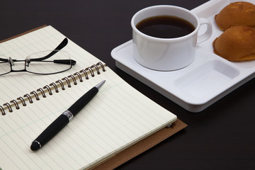 Cup of coffee and book