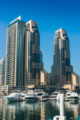 Obraz na płótnie Canvas High rise buildings and streets in Dubai, UAE