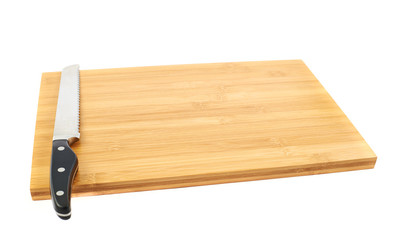 Steel kitchen knife on cutting board