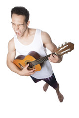 Obraz premium Young Guitar Player Performing