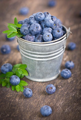 Blueberries in the small bucket