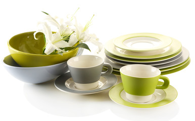 Empty bowls, plates and cups isolated on white