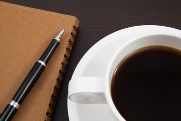 Cup of coffee and book