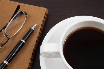 Cup of coffee and book