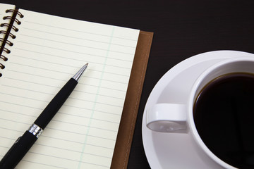 Cup of coffee and book