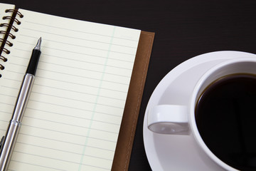 Cup of coffee and book