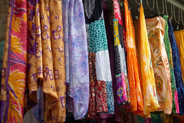 Colorful dresses in a street market