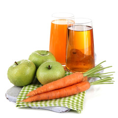 Glasses of juice, apples and carrots, isolated on white