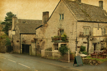 Fototapeta na wymiar small cafe in Bibury, Gloucestershire, England. Paper texture.