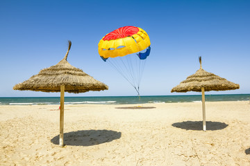 Parasailing on the beach of the Mediterranean in Tunisia