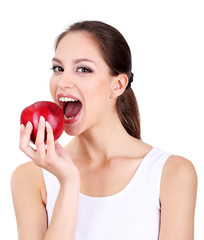 Young woman with apple isolated on white