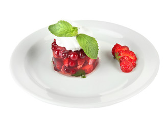 Tasty jelly dessert with fresh berries, isolated on white