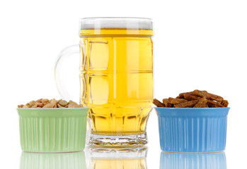 Beer in glass,croutons.and nuts isolated on white