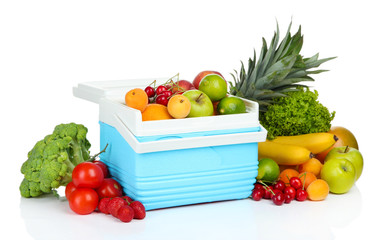 Fresh fruits and vegetables in mini refrigerator, isolated
