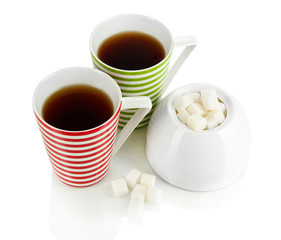Tea cup and sugar-bowl on white background