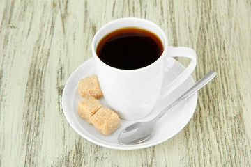 Fototapeta na wymiar Cup of coffee, on color wooden background