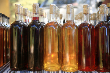 close up of bottles with wine