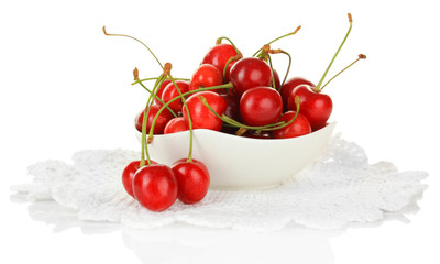Cherry berries in bowl isolated on white