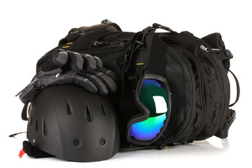 Winter sport glasses, helmet and gloves, backpack, isolated