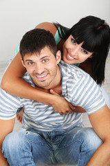 Fototapeta premium Beautiful loving couple sitting