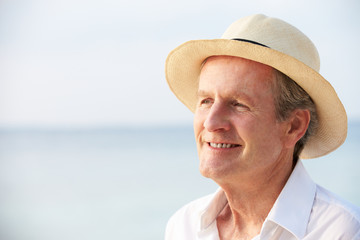 Senior Man On Tropical Beach Holiday