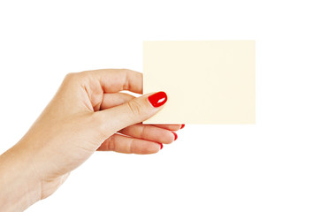 Female hand with red nails holding a blank card