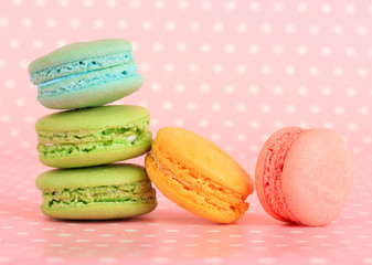 Gentle macaroons on pink background