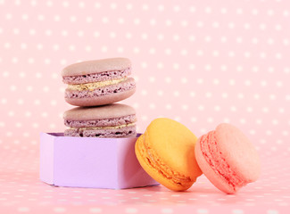 Gentle macaroons on pink background