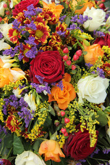 Mixed floral arrangement in yellow, red and white