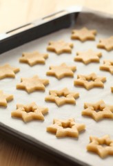 Baking cookies for Christmas. Cookies on baking sheet.