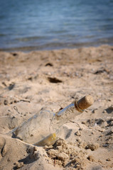 bottle with message in beach