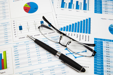 Fototapeta premium Financial paper charts and graphs