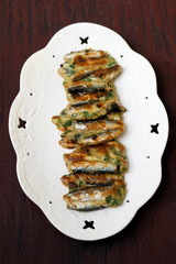 Chive and anchovy fritters