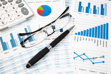 Fototapeta premium Financial paper charts and graphs