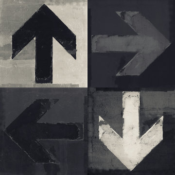 Fototapeta Four arrows signs painted on a wall, grunge design arrows set