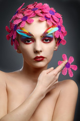 portrait with flowers and feathers