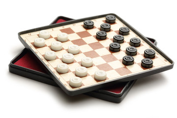 Travelling draughts on playing field