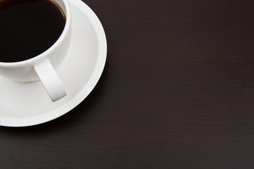 Cup of coffee and paper