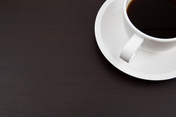 Cup of coffee and paper